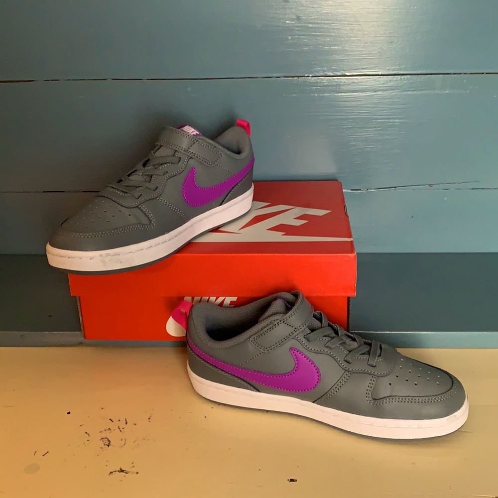 Grey and purple Nike shoes